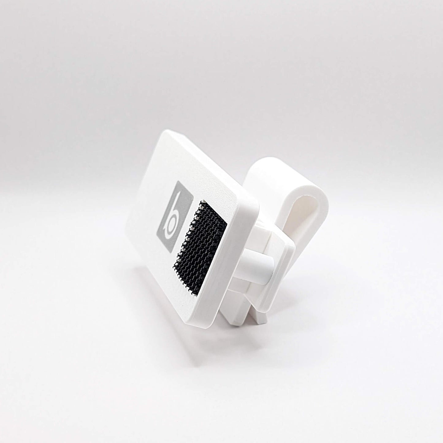 ProtoClip™ golf utility clip designed to hold tees, markers, and gloves for convenient access on the course.